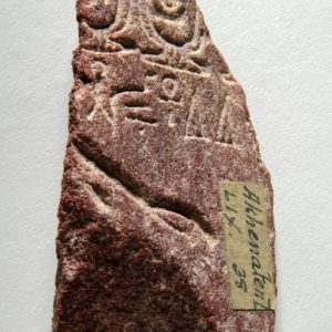 Ancient Egyptian inscribed red quartzite fragment from Amarna dated 1350 – 1325 BC