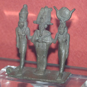 Ancient Egyptian bronze figure of Osiris with Horus and Isis from Saqqara dated 664 – 332 BC