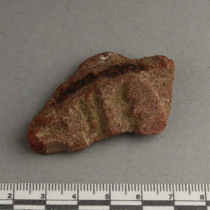 Ancient Egyptian inscribed red quartzite fragment from Amarna dated 1550 – 1295 BC