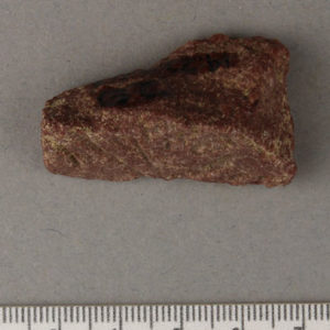 Ancient Egyptian inscribed red quartzite fragment from Amarna dated 1550 – 1295 BC