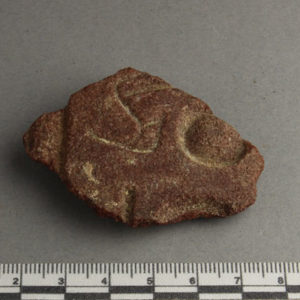 Ancient Egyptian inscribed red quartzite fragment from Amarna dated 1550 – 1295 BC