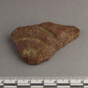 Ancient Egyptian inscribed red quartzite fragment from Amarna dated 1550 – 1295 BC