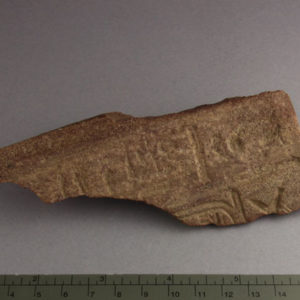 Ancient Egyptian inscribed red quartzite fragment from Amarna dated 1550 – 1295 BC