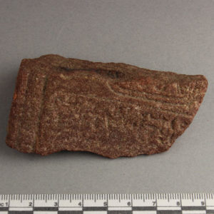 Ancient Egyptian inscribed red quartzite fragment from Amarna dated 1550 – 1295 BC