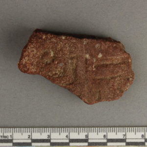 Ancient Egyptian inscribed red quartzite fragment from Amarna dated 1550 – 1295 BC