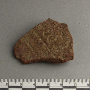 Ancient Egyptian inscribed red quartzite fragment from Amarna dated 1550 – 1295 BC