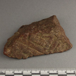 Ancient Egyptian inscribed red quartzite fragment from Amarna dated 1550 – 1295 BC