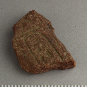 Ancient Egyptian inscribed red quartzite fragment from Amarna dated 1550 – 1295 BC