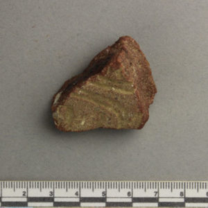 Ancient Egyptian inscribed red quartzite fragment from Amarna dated 1550 – 1295 BC