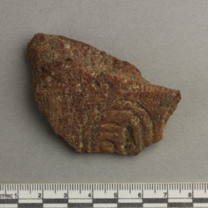 Ancient Egyptian inscribed red quartzite fragment from Amarna dated 1550 – 1295 BC