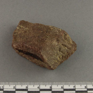 Ancient Egyptian inscribed red quartzite fragment from Amarna dated 1550 – 1295 BC