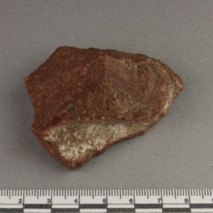 Ancient Egyptian decorated red quartzite fragment from Amarna dated 1550 – 1295 BC