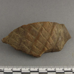 Ancient Egyptian decorated red quartzite fragment from Amarna dated 1550 – 1295 BC