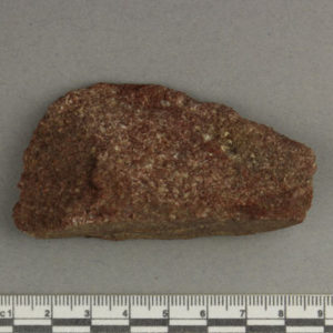 Ancient Egyptian decorated red quartzite fragment from Amarna dated 1550 – 1295 BC