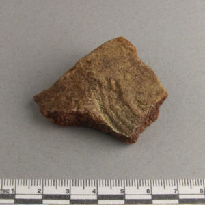 Ancient Egyptian decorated red quartzite fragment from Amarna dated 1550 – 1295 BC