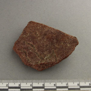 Ancient Egyptian decorated red quartzite fragment from Amarna dated 1550 – 1295 BC