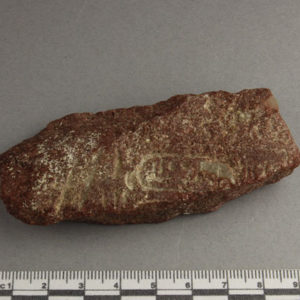 Ancient Egyptian inscribed red quartzite fragment from Amarna dated 1550 – 1295 BC