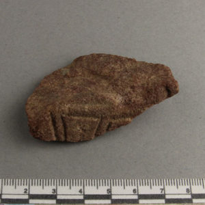 Ancient Egyptian decorated red quartzite fragment from Amarna dated 1550 – 1295 BC