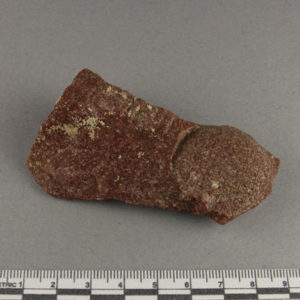 Ancient Egyptian inscribed red quartzite fragment from Amarna dated 1550 – 1295 BC