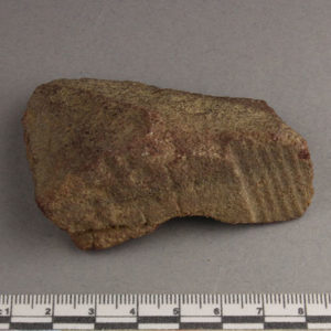 Ancient Egyptian inscribed red quartzite fragment from Amarna dated 1550 – 1295 BC