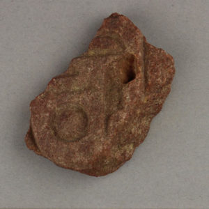 Ancient Egyptian inscribed red quartzite fragment from Amarna dated 1550 – 1295 BC