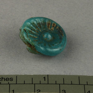 Ancient Egyptian glass rosette from Amarna dated 1550 – 1295 BC