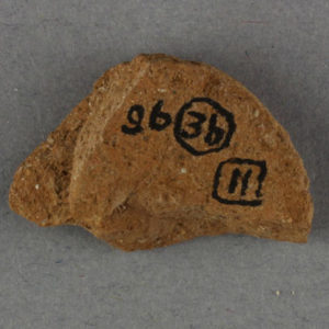 Ancient Egyptian pottery disc fragment from Amarna dated 1550 – 1069 BC